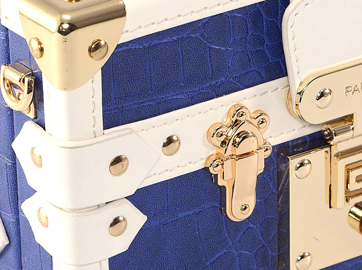 Mitred brass corner cap, side catch and studs on the Coffret Azur