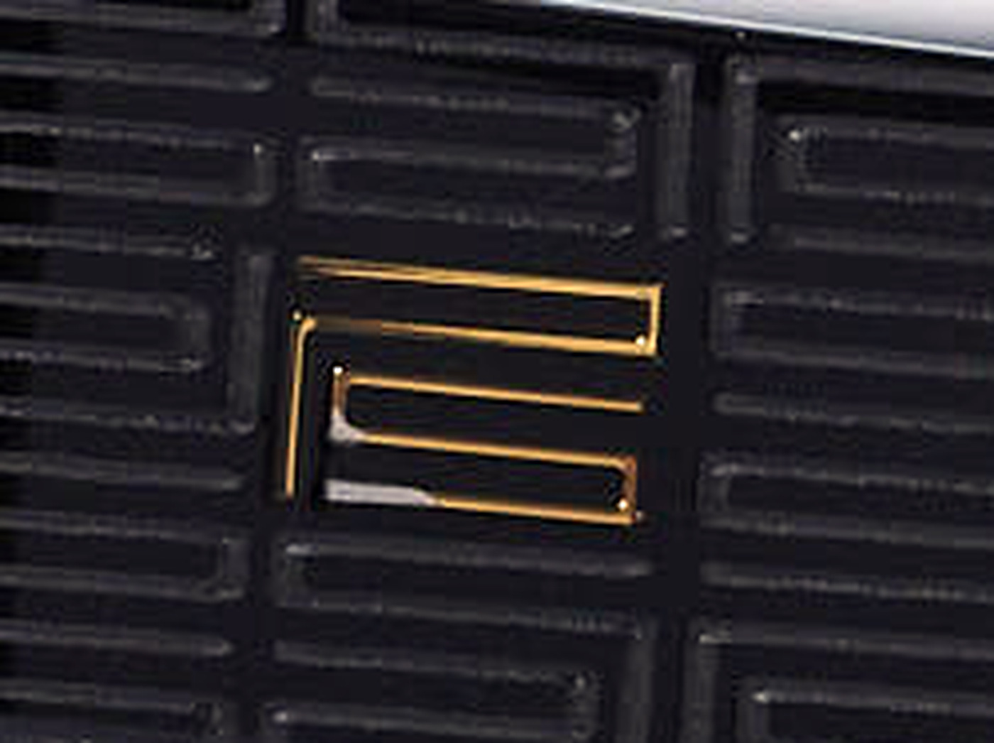 The PS pattern cut into the temple of the Square