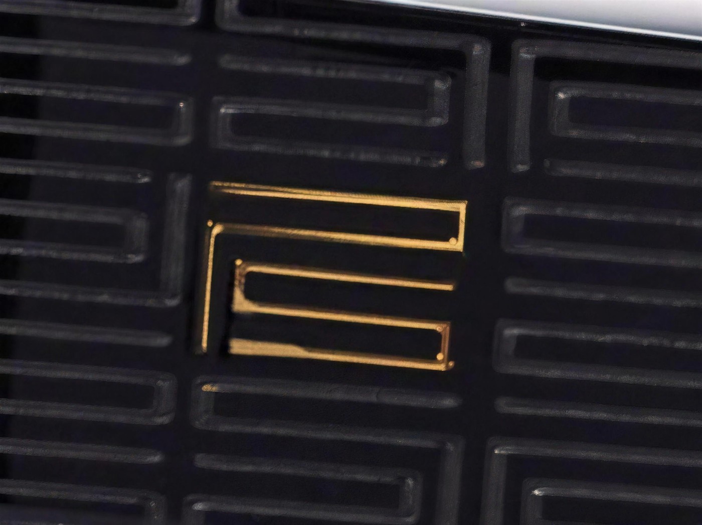 The PS pattern cut into the temple of the Square